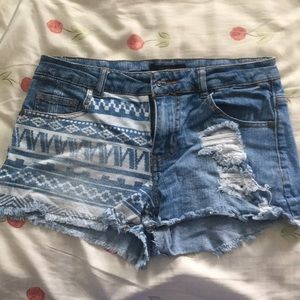 Forever 21 jean shorts size 25. Tribal pattern.